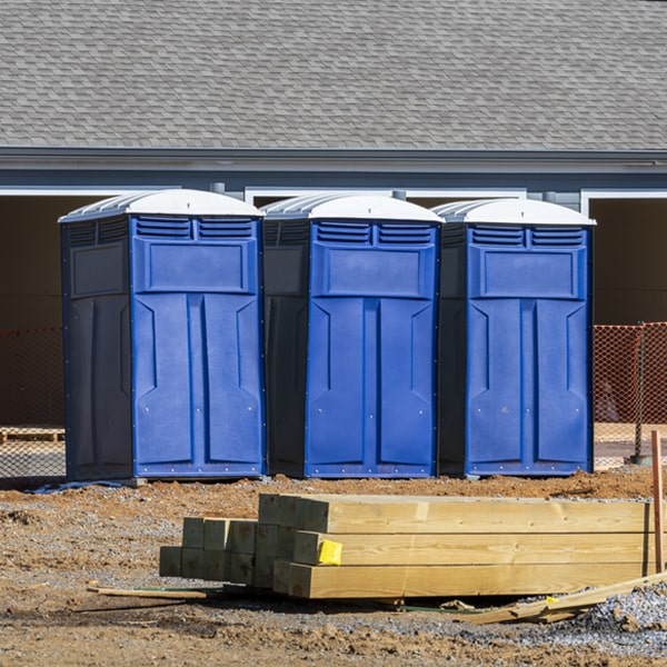 what is the cost difference between standard and deluxe portable toilet rentals in Montague Massachusetts